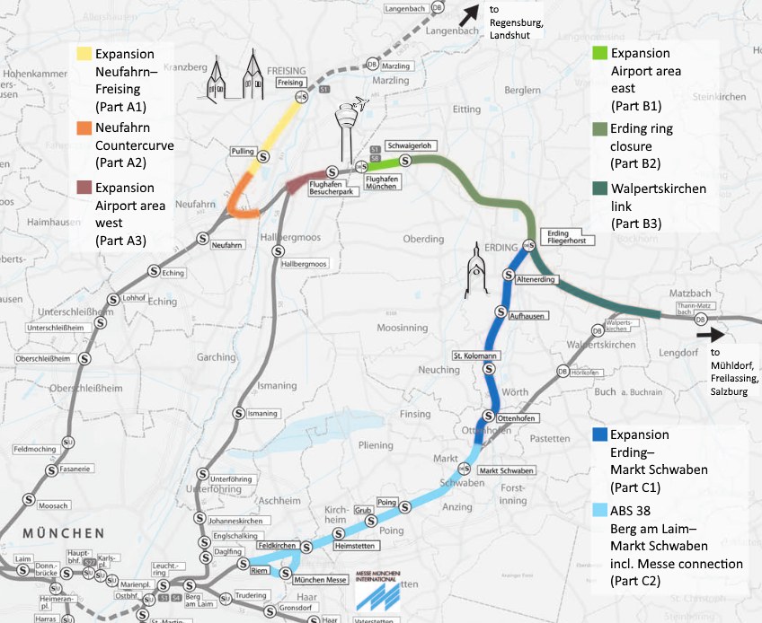 Ein detaillierter Stadtplan mit einer hervorgehobenen Bahnroute von München nach Frankfurt, einschließlich Haltestellen und Umgebung, mit Text, der Bahninformationen bereitstellt.