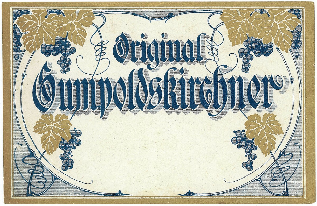 Altes deutsches Wein-Etikett mit einer Illustration von Trauben und Blättern und Text, der den Wein-Typ angibt.