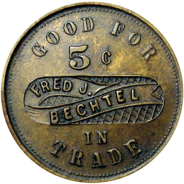 Goldmünze mit der Aufschrift "Gut für 5c Fred J. Bechtel im Handel" auf weißem Hintergrund.