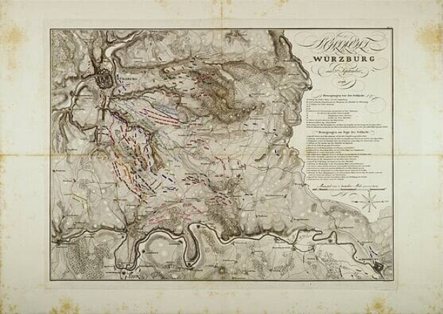 Ausführliche alte Karte von Würzburg, Deutschland, die Straßen, Gebäude und Sehenswürdigkeiten zeigt, sowie begleitenden Text über Bevölkerung, Straßen und bemerkenswerte Merkmale.