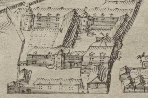 Eine handgezeichnete Stadtansicht mit mehreren Gebäuden, die um ein Haus in der Mitte angeordnet sind, auf Papier mit sichtbarer Schrift.